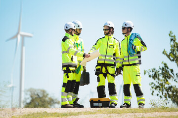 Team of electrical engineer is perform the inspection and maintenance of electric generating windmill turbine.