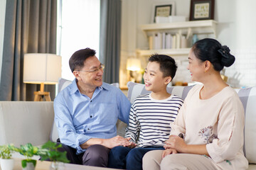 Asian family in living room