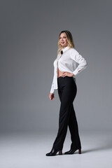 Fashion shooting in studio . Professional model , fashionable clothes and style, new collection. stylish look