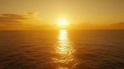 Obraz premium Golden Sunset Over Calm Ocean Waters