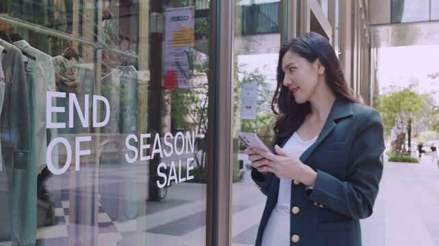 Women Enjoying Outdoor Shopping During Exciting Season Sale at Local Fashion Store. " End of season sale " shopping promotion