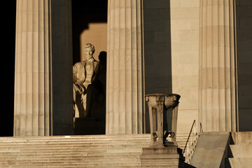 Lincoln statue in high contrast morning light at Lincoln Memorial - Washington D.C. United States...