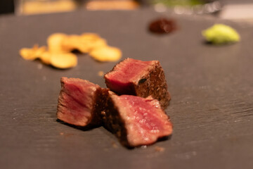 Delicious gourmet steak slices on a plate.