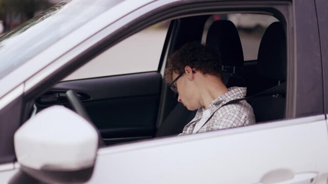 Teenager Buckling Seatbelt, Ready to Drive