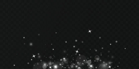 White dust light.Christmas background of shining dust.
