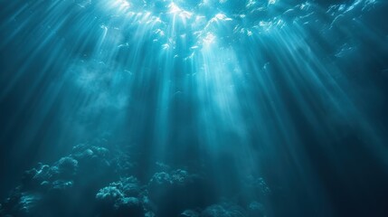 Obraz premium The sun casts a shimmering glow as its rays penetrate the crystal-clear water of the ocean.
