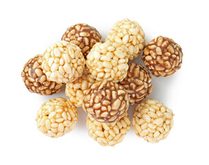 Tasty puffed rice balls isolated on white, top view