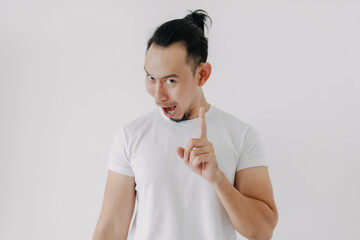 Funny smile of knowing secret tips face Asian man in white t-shirt on white.