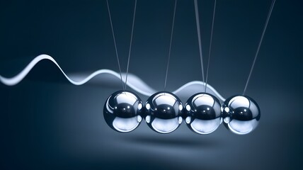 Newton's Cradle with Motion Blur Capturing Energy Transfer for Stock Images