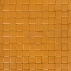 Close up photo of yellow mustard  hand woven synthetic rattan texture. Wicker art or rattan weaving art pattern in many shapes. Seamless texture.