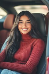 Woman in car smiling