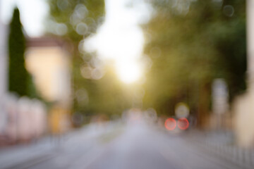 blurred street abstraction unfocused background morning sun rise summer light outdoor silhouette view