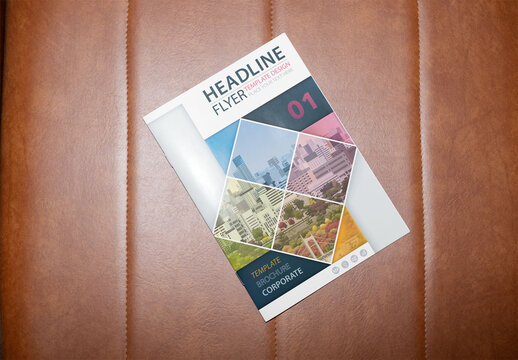 overhead view of magazine cover in white glossy A4 paper