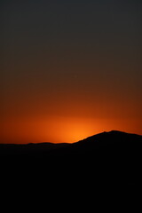 Orange sunset in the mountains