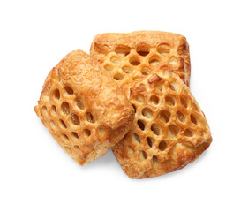 Delicious puff pastries with fruit filling isolated on white, top view