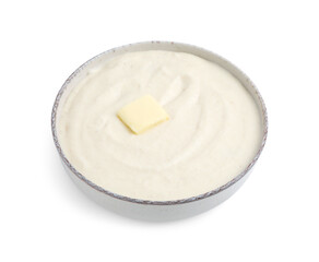 Tasty cooked semolina porridge with butter isolated on white