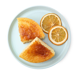 Tasty semolina cake and orange slices isolated on white, top view