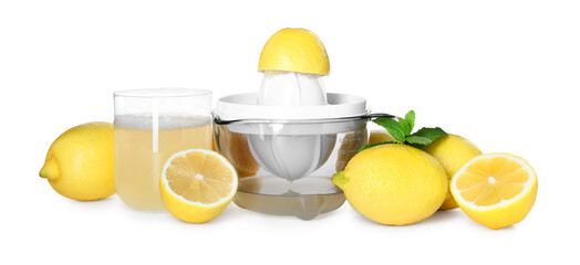 Juicer, fresh juice, lemons and mint isolated on white