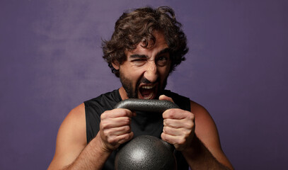 young bearded crazy fitness man sport concept