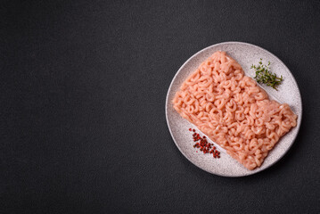 Raw minced chicken with salt, spices and herbs