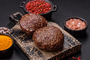 Beef burger patties with salt, spices and herbs