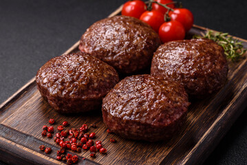 Beef burger patties with salt, spices and herbs