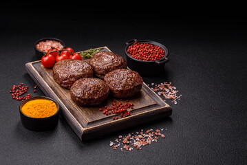 Beef burger patties with salt, spices and herbs