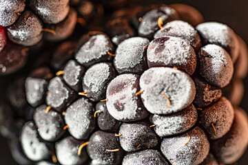 Macro photo of blackberries covered with frost