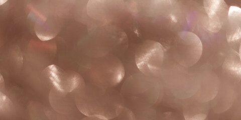 Abstract bokeh background banner mocha mousse colored, natural optical flare from sunlight, trend...