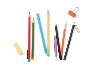 Set of cut-out stationery items, including pencils, pens, erasers, and clips, isolated on a white background.