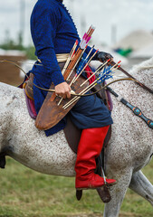 Turkish archer on horse wearing traditional ethnic costume at Etnospor Kultur Festivali. Istanbul -...