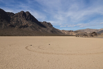 Moving rocks in the dry lake at The Racetrack at Death Valley National Park, California
