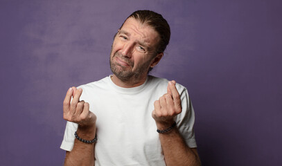 feeling sad and stressed, no money gesture, with a negative and anxious look