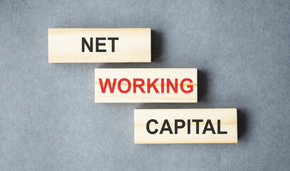 Net Working Capital text on wooden blocks.