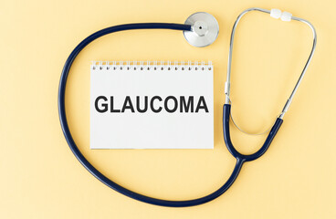 doctor's working table with the frame and the text - Glaucoma