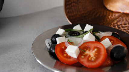 Greek salad with pixel tomatoes, cucumbers, salamoya olives, feta cheese, white onion, olive oil....