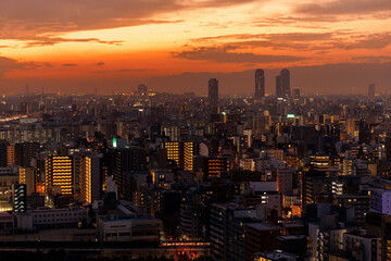 Obraz premium Osaka Urban Cityscape Captured at Sunset,