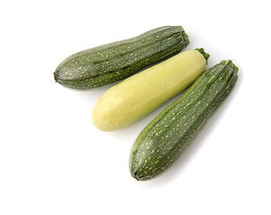 green zucchini vegetables isolated on white.
