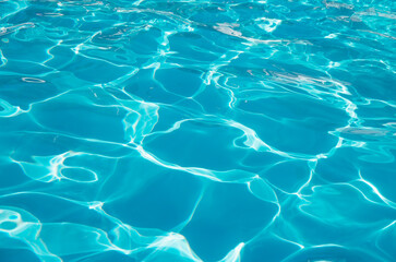 water in swimming pool rippled water detail background