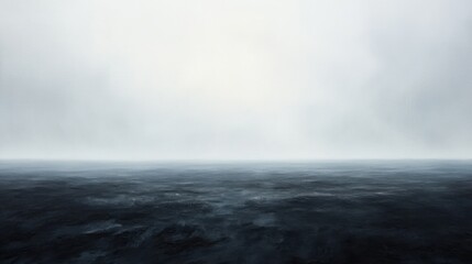 Fototapeta premium Barren plowed field in dense white fog