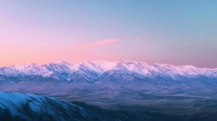 Majestic Snowcapped Mountains at Pastel Sunset