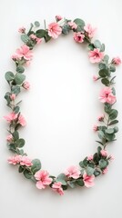 Obraz premium Delicate Floral Frame: A whimsical oval frame crafted from delicate pink blossoms and verdant eucalyptus leaves, creating a charming backdrop for a special message or celebration. 