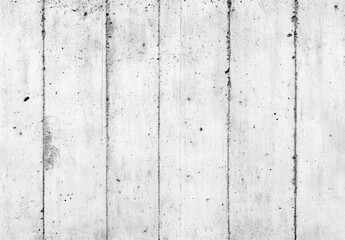 白いコンクリート壁のパターンは、洗練された工業的な雰囲気を作り出しています