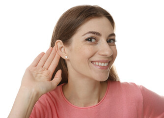 Woman showing hand to ear gesture on white background