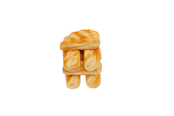 A stack of milk buns on a transparent background. The milk buns are folded to resemble a house.