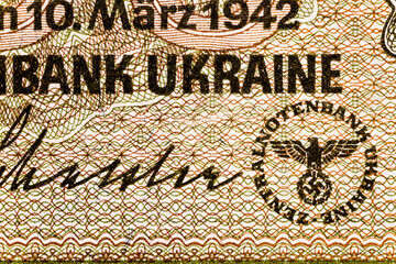 Vintage elements of old paper banknotes.Old 200 karbovanez bill of Ukraine. Occupying the money of the German Reich in 1942,Rovno