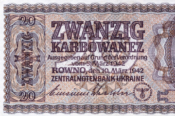 Vintage elements of old paper banknotes.Old 20 karbovanez bill of Ukraine. Occupying the money of the German Reich in 1942,Rovno
