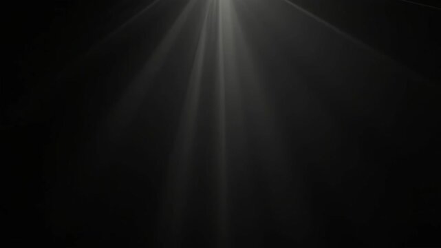 White light beams on black background. Bright effect. Spotlight ray abstract animation. Dynamic video footage. Dim stage lighting