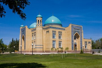 Beautiful Muslim mosque in blue skies and grass