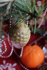 Bright festive background, holiday, cozy home, time of miracles, Christmas, magic, mood, beautiful texture, shining garlands, winter, warm atmosphere, greetings, candles and tangerines,fir branches